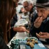 Visitors taste and smell truffles during the Alba International White Truffle Fair in Piedmont.