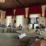 Reunião do CGIE para a América Latina em andamento no Palazzo Garibaldi, em Curitiba.